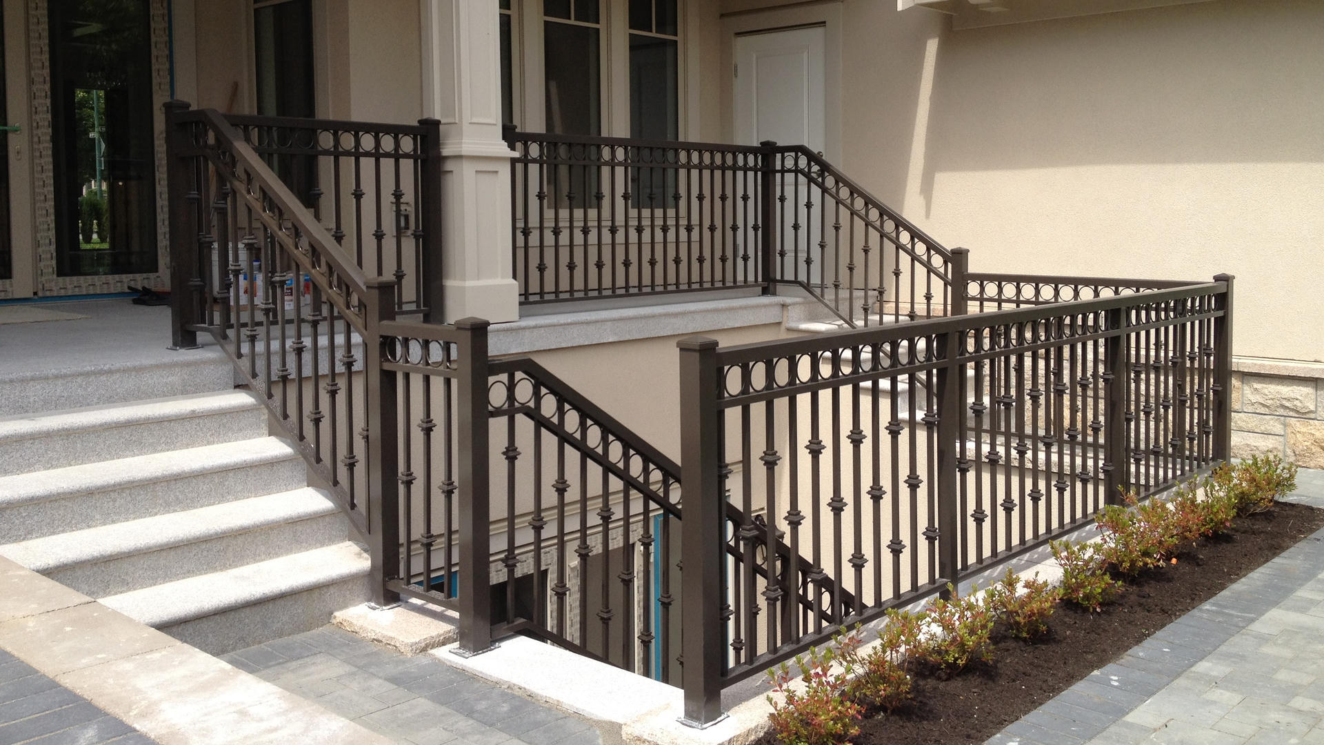Brown railing along stairs