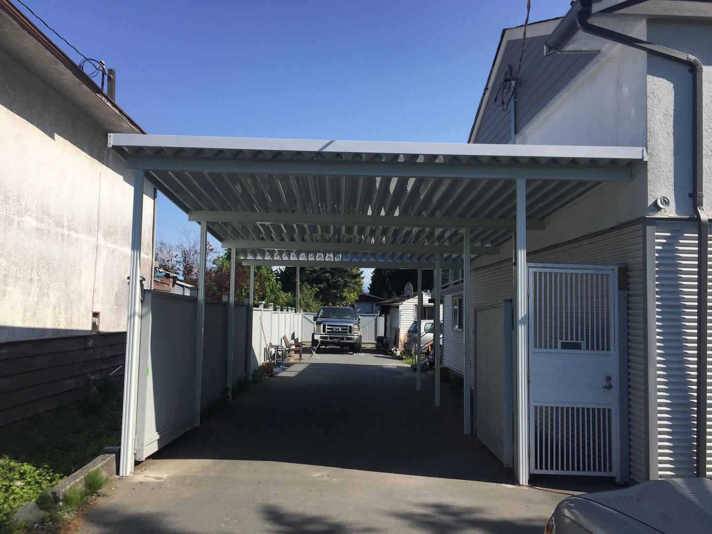 Carport on the side of house