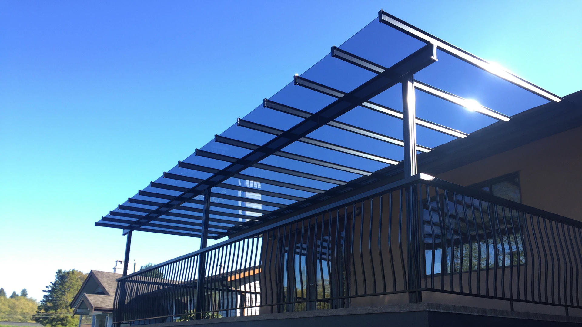 Sleek glass patio cover
