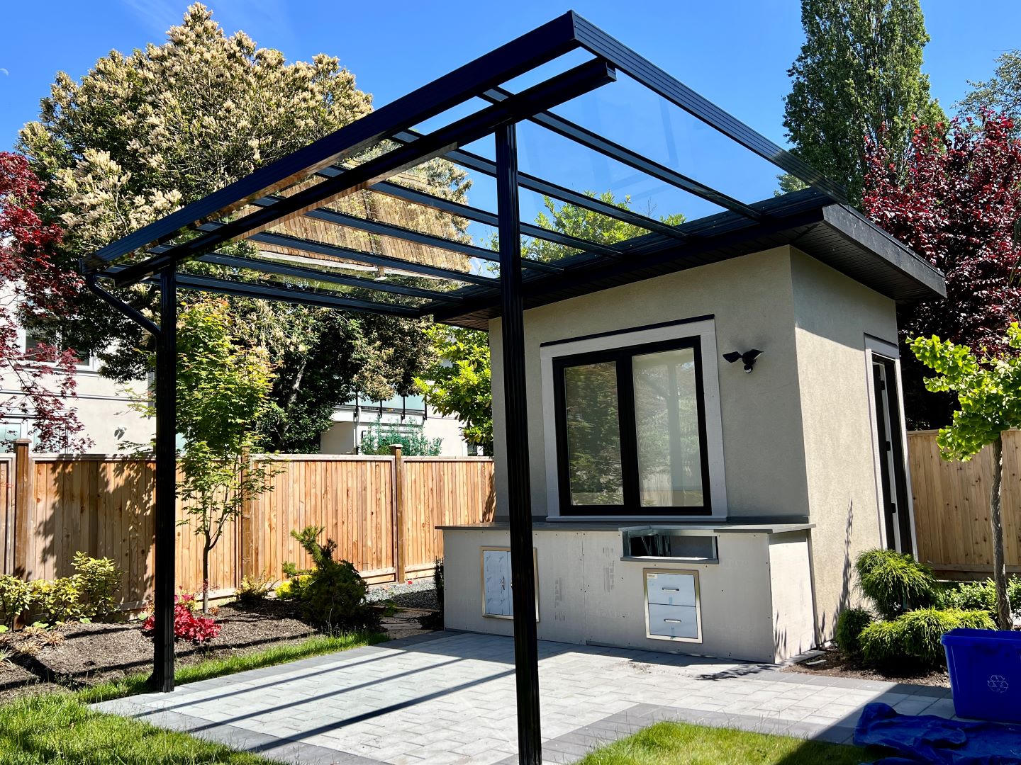 Glass patio cover for BBQ