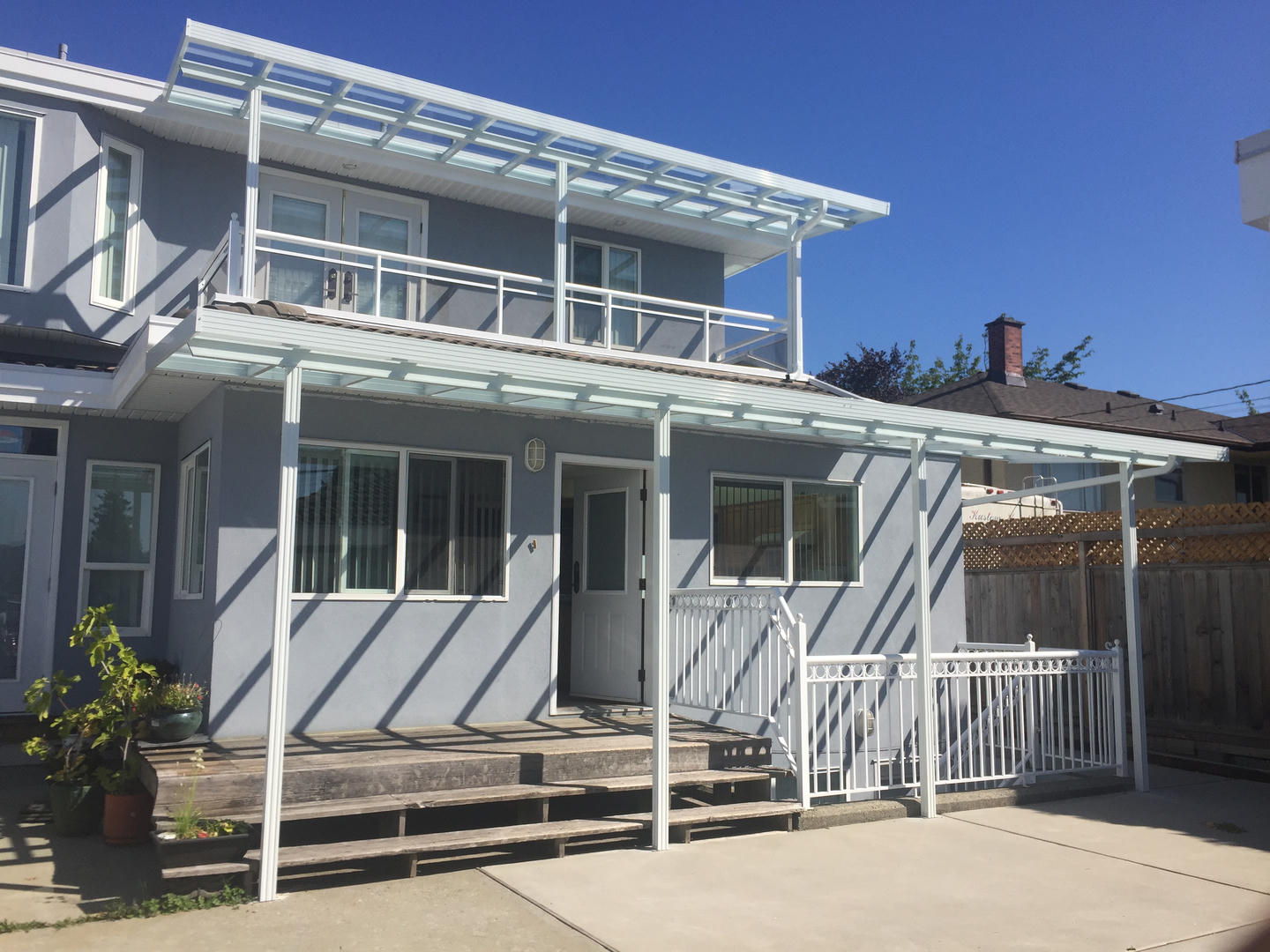 Glass Patio Cover on two storeys