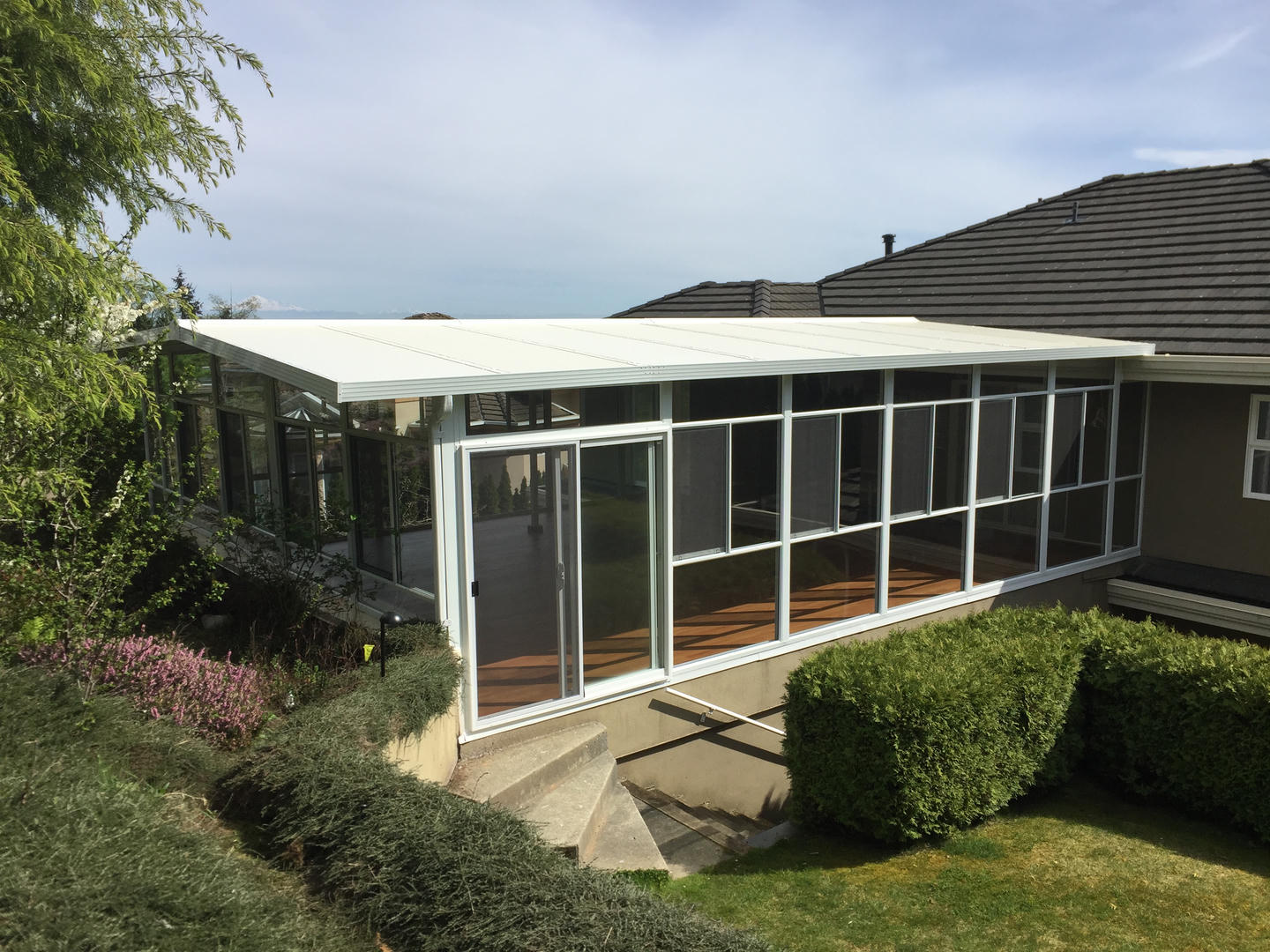 Expansive sunroom in the backyard